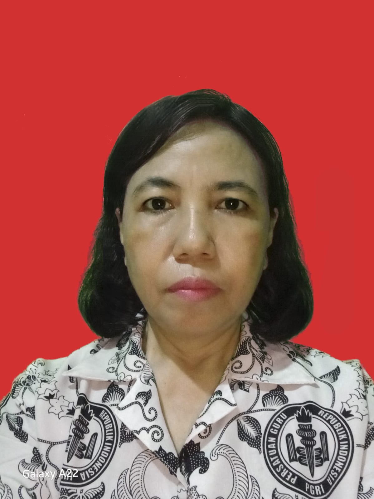 L. Femmy Saroinsong, S.Pd.